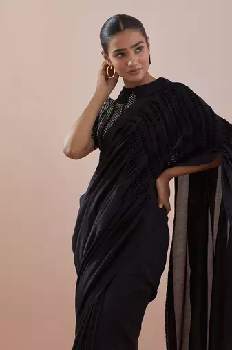 Black chanderi saree with textured cotton blouse in black