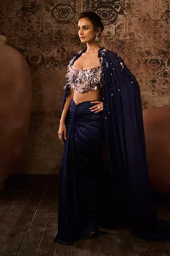 Navy blue embroidered corset with embroidered cape with drape skirt