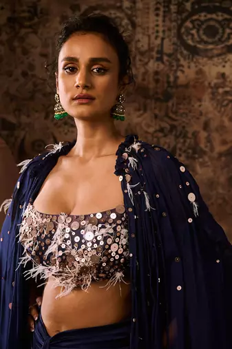 Navy blue embroidered corset with embroidered cape with drape skirt