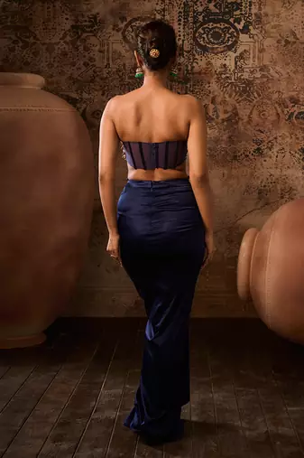 Navy blue embroidered corset with embroidered cape with drape skirt