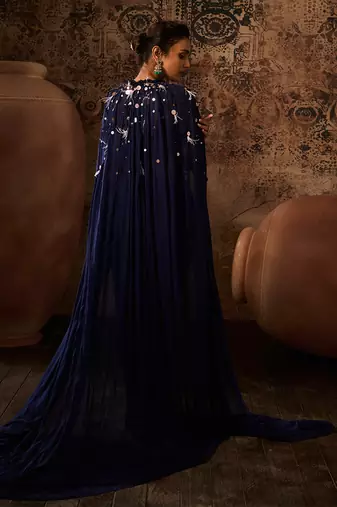 Navy blue embroidered corset with embroidered cape with drape skirt