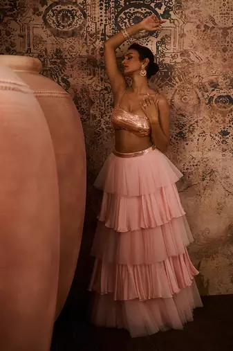 Rose gold embroidered top with pink layered skirt