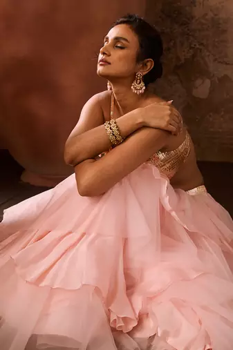 Rose gold embroidered top with pink layered skirt