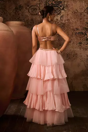 Rose gold embroidered top with pink layered skirt
