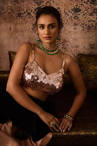 Rose gold embroidered blouse with black and rose gold layerd skirt  with dupatta