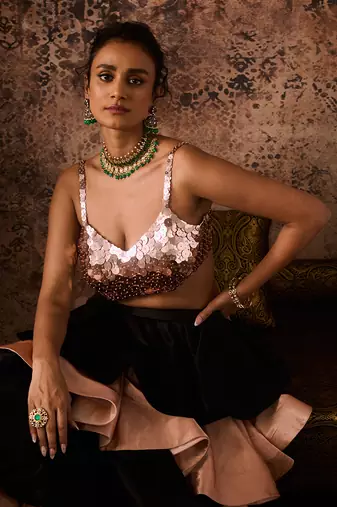 Rose gold embroidered blouse with black and rose gold layerd skirt  with dupatta