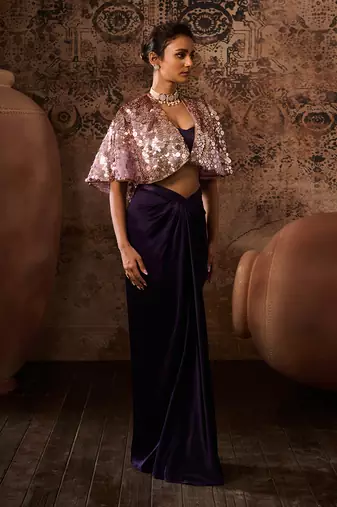 Lilac embroidered cape with purple skirt and bustier