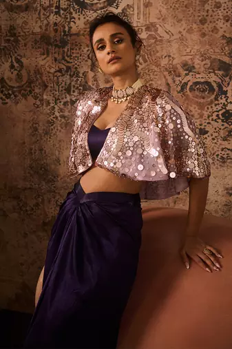 Lilac embroidered cape with purple skirt and bustier