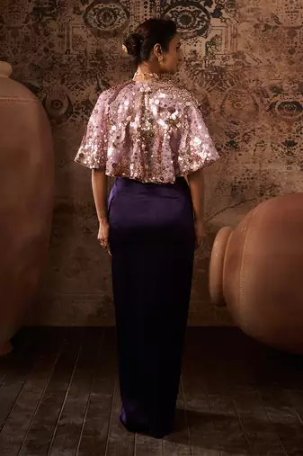 Lilac embroidered cape with purple skirt and bustier