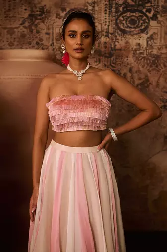 Pink embroidered top with multiple coloured skirt