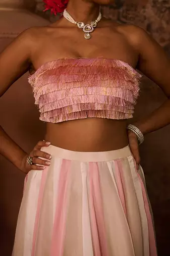 Pink embroidered top with multiple coloured skirt