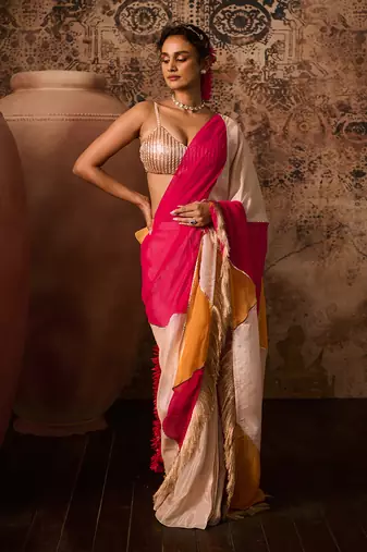 Rose gold embroidered blouse with multicoloured saree