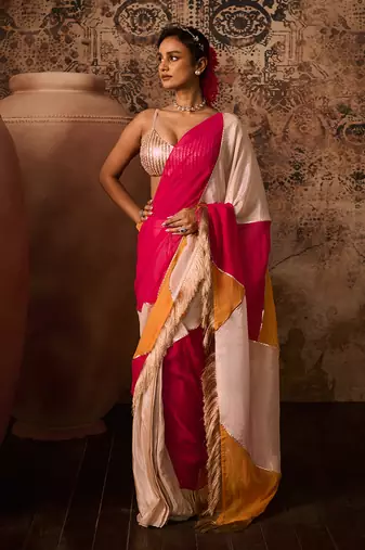 Rose gold embroidered blouse with multicoloured saree