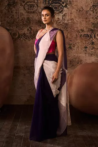 Hot pink blouse with multicoloured saree
