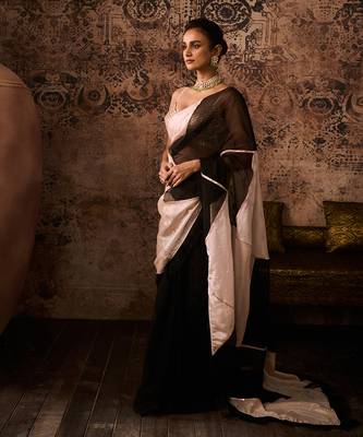 Peach embroidered blouse with black and peach colour block saree 2