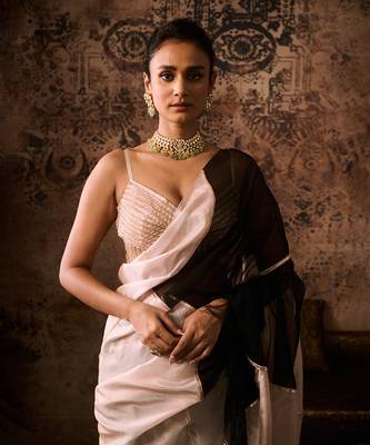 Peach embroidered blouse with black and peach colour block saree 3