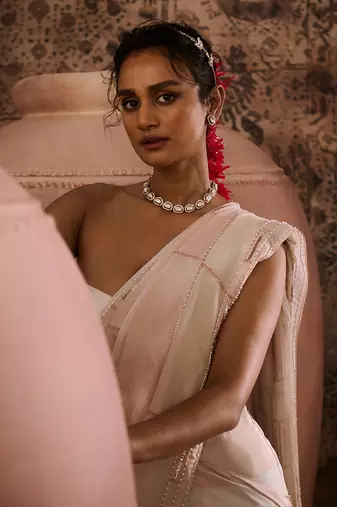 White blouse with tissue embroidered saree