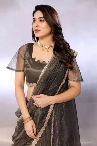 Net embellished saree with blouse piece