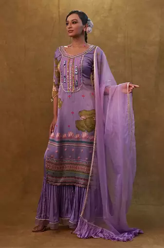 Lavender printed kurta set paired with organza dupatta and flared pants
