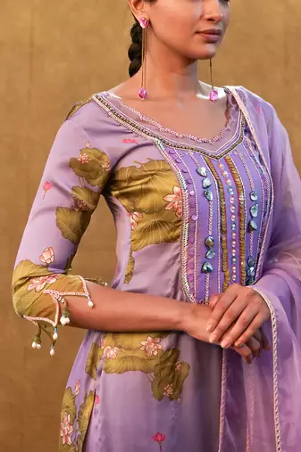 Lavender printed kurta set paired with organza dupatta and flared pants