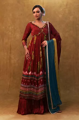 Lavender printed kurta set paired with organza dupatta and flared pants