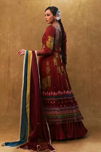 Maroon printed anarkali paired with skirt and dupatta