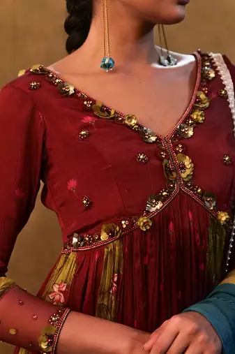 Maroon printed anarkali paired with skirt and dupatta