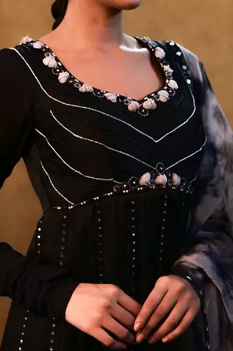 Black anarkali paired with tie- dye dupatta and flared pants