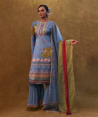 Ocean blue printed kurta set paired with color block dupatta and flared pants. 2