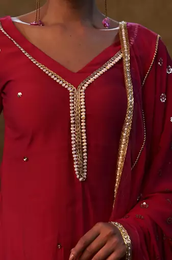 Hot pink kurta set paired with sequin embroidery dupatta and pants