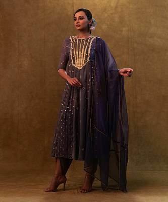 Charcoal blue anarkali suit paired with dupatta and drape pants. 2