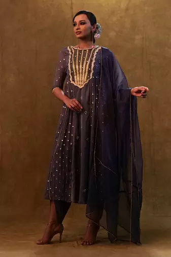 Charcoal blue anarkali suit paired with dupatta and drape pants.