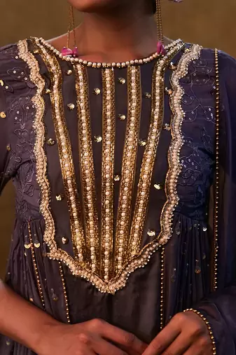 Charcoal blue anarkali suit paired with dupatta and drape pants.