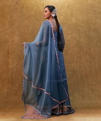 Blue applique work kurta set paired with flared sharara and a dupatta. 2