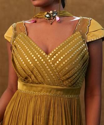 Olive peplum set paired with pants and a neck dupatta 3