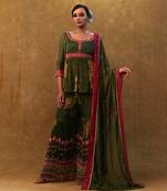 Green printed sharara set paired with color block dupatta and a peplum.