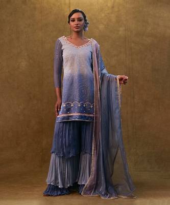 Ice blue shaded sharara set paired with dupatta and layered colour block sharara. 1