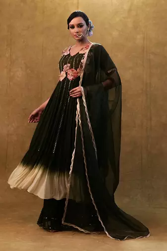 green shaded anarkali set paired with dupatta and pants.
