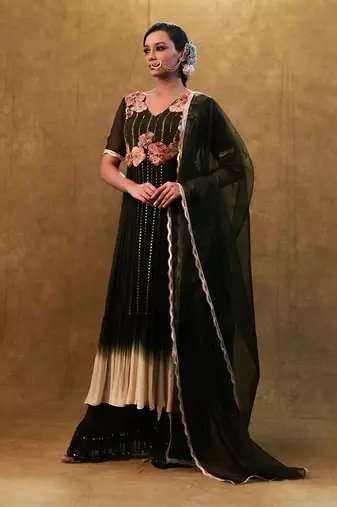 green shaded anarkali set paired with dupatta and pants.