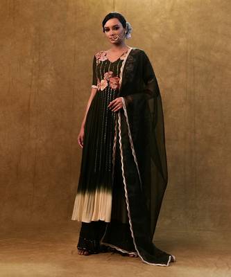 green shaded anarkali set paired with dupatta and pants. 1