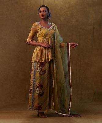 Mustard printed peplum set paired with dupatta and pants 2