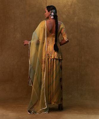 Mustard printed peplum set paired with dupatta and pants 3