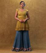 Sharara set paired with flared top and a neck dupatta.