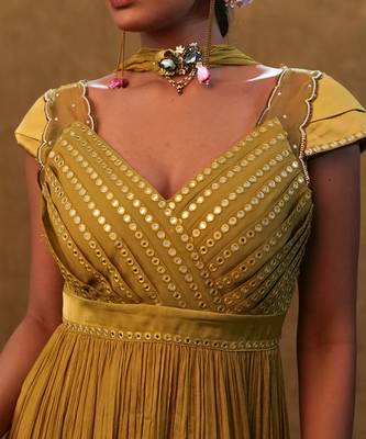 Sharara set paired with flared top and a neck dupatta. 3