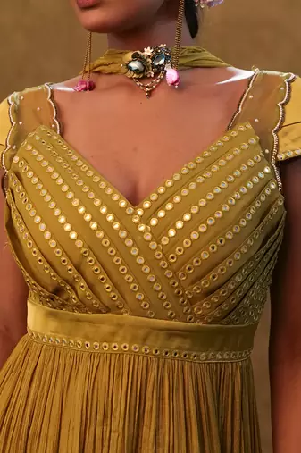 Sharara set paired with flared top and a neck dupatta.