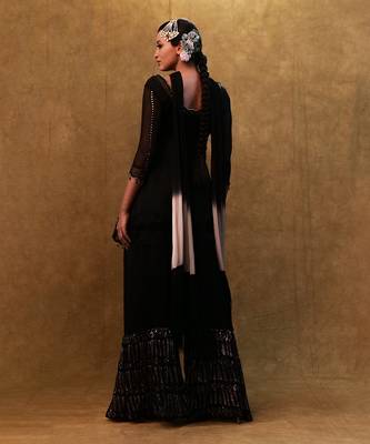 Black kurta set paired with fringe dupatta and flared pants 3
