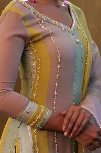 Color block kurta set paired with dupatta and pants