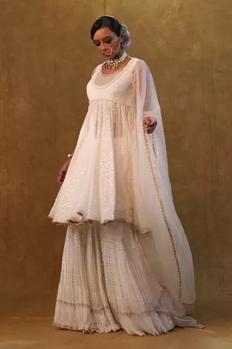 White anarkali set paired with skirt and dupatta