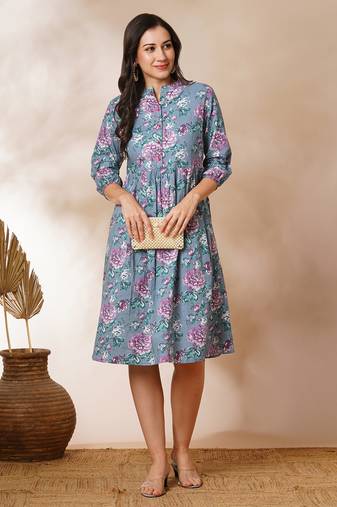 Fit and flared floral printed gathered dress with stand collar, placket and sleeve detailing.