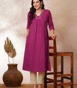 A-line woven cotton kurta with vibrant thread embroidery and gathering.